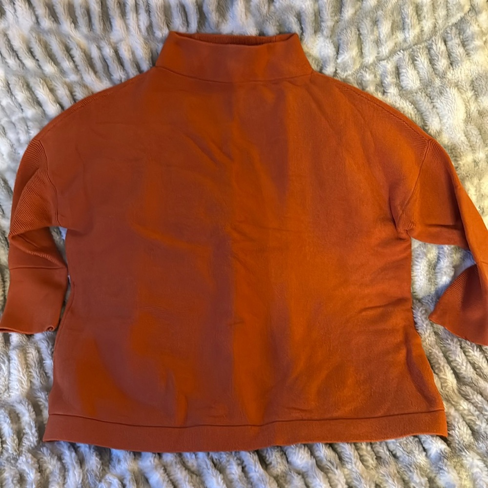 Cute oversized orange sweater. Size large.